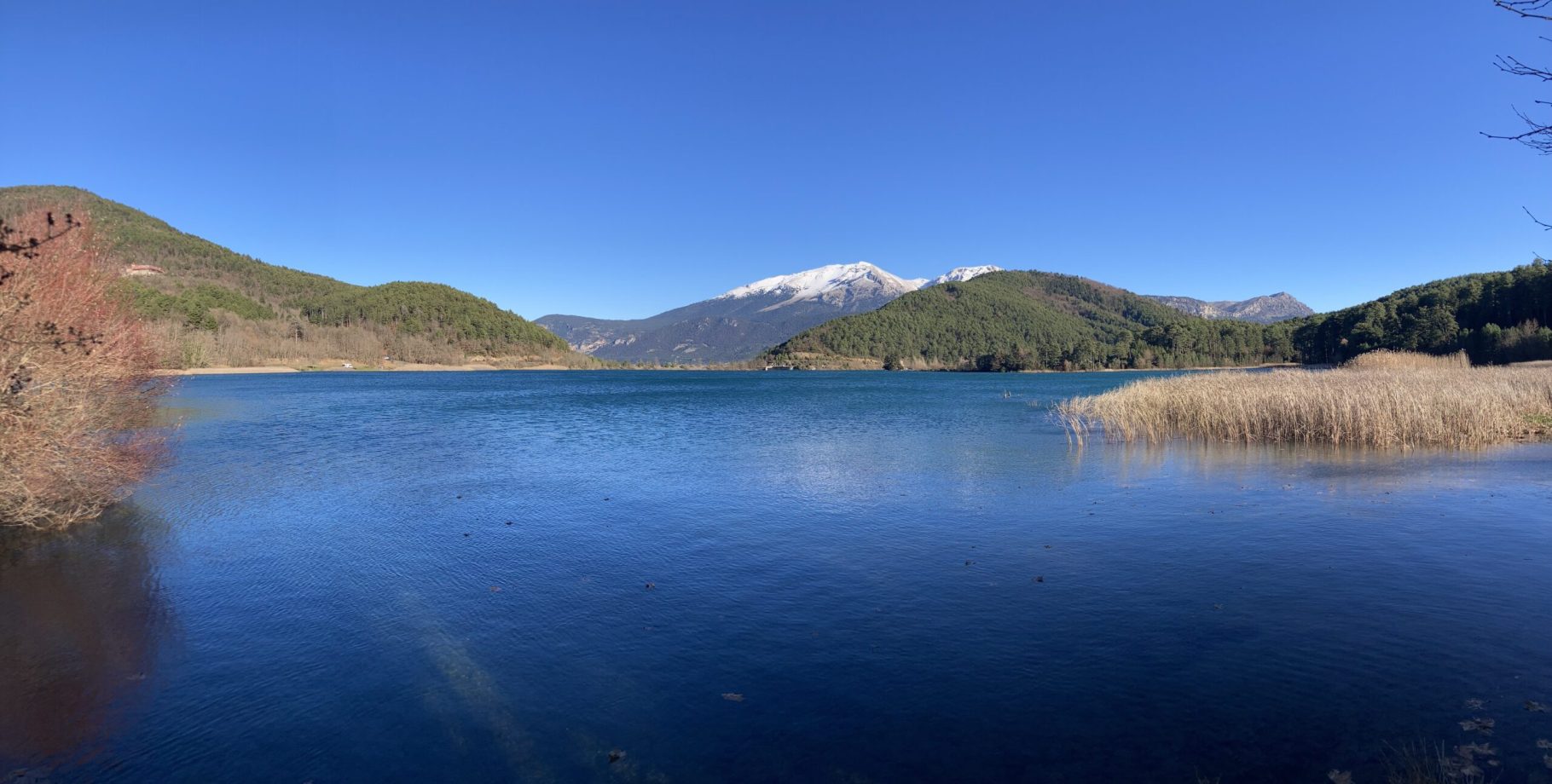 Doxa Lake with sowy mountain view